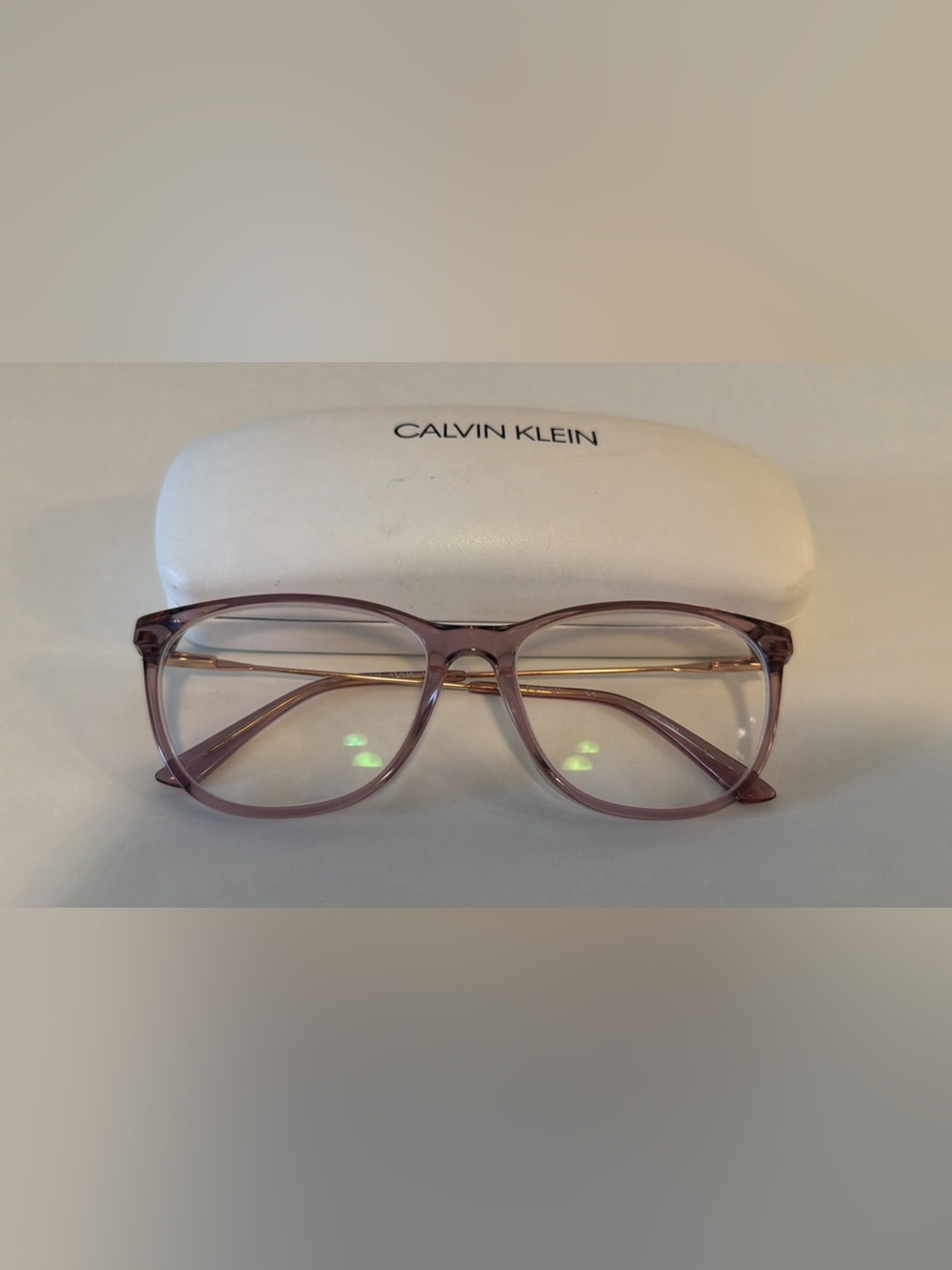 Calvin Klein Translucent Pink Frame Glasses
